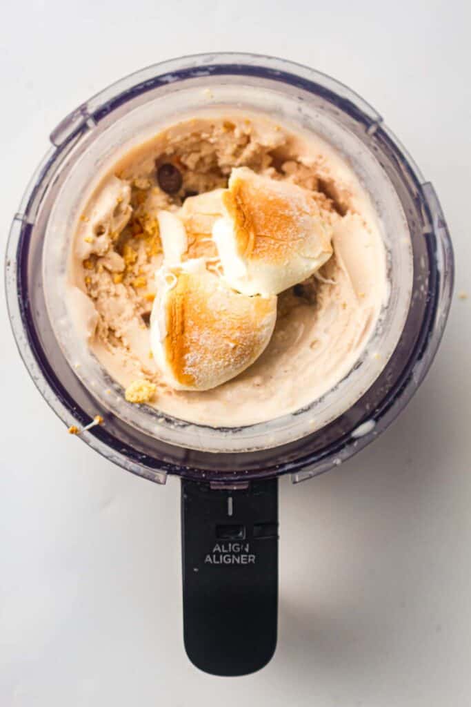 Toasted marshmallows added to a well in the center of churned chocolate ice cream