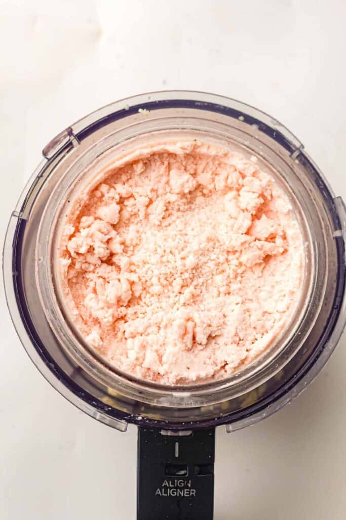 Crumbly strawberry cheesecake ice cream after the first spin cycle