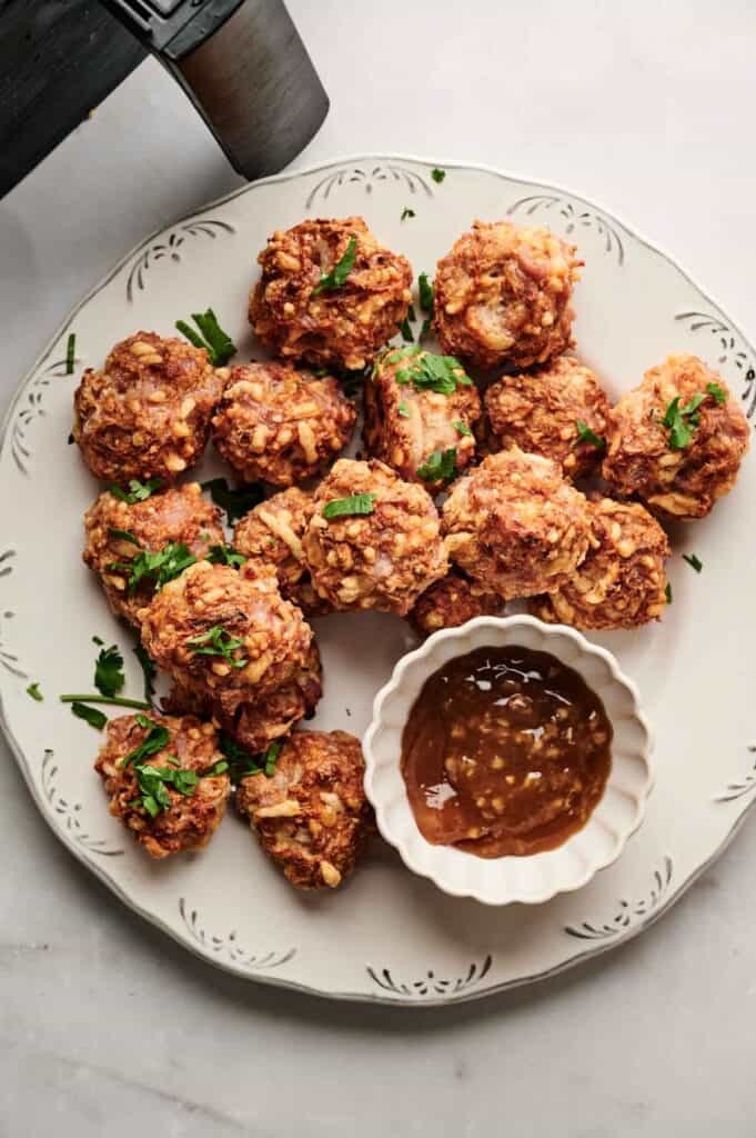 Air fryer sausage balls served with lemon garlic dipping sauce